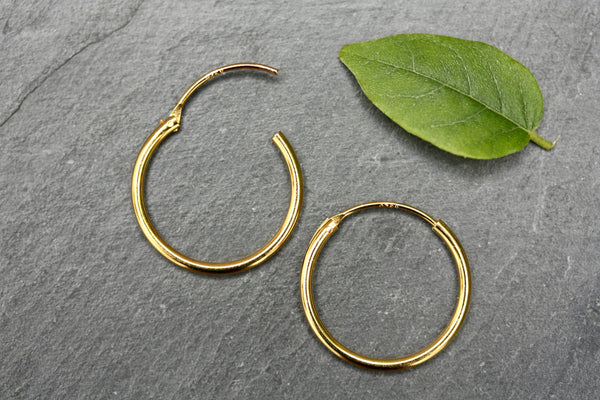 20mm plain sterling silver gold plated hoops.