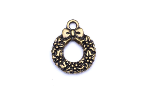 Brass Christmas charm.  Ideal for jewellery making and other festive crafts.