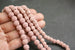6mm and 8mm round pink unwaxed lava stone beads, diffuser beads, mala beads.