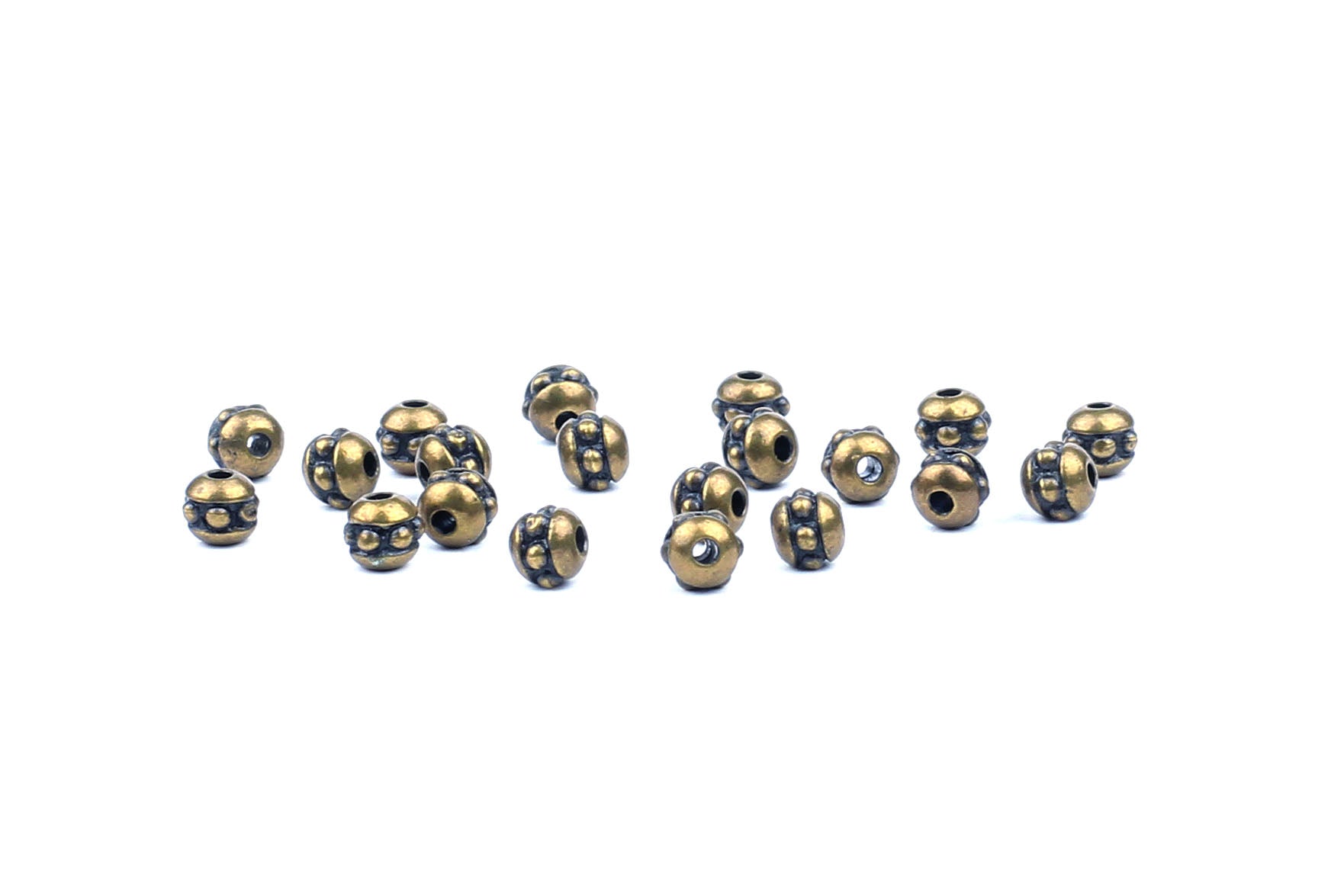 Brass spacer beads top