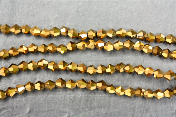 Kerrie Berrie UK 4mm Glass Bicone Beads for Jewellery Making and Beading in Metallic Gold
