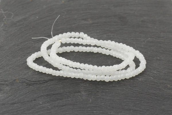 1.5mm x 2mm Opaque White Crystal Glass Faceted Bead Strand