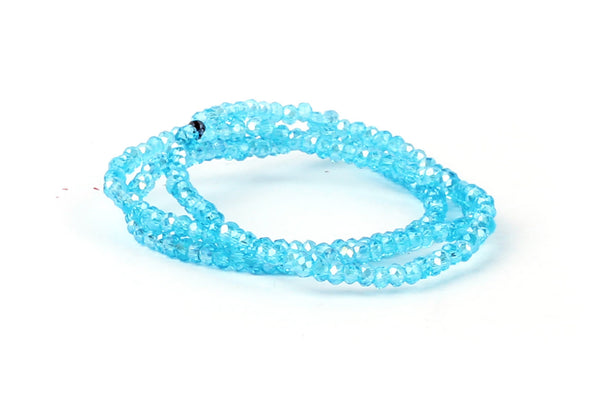 1.5mm x 2mm Transparent Blue Crystal Glass Faceted Bead Strand
