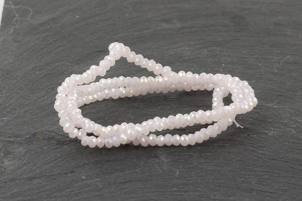 1.5mm x 2mm Very Light Pink Crystal Glass Faceted Bead Strand